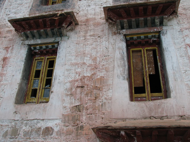 Broken windows in the Gadong monastery. Gadong, Tibet.